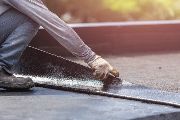 Professional Basement Waterproofing technician working in Walled Lake, MI